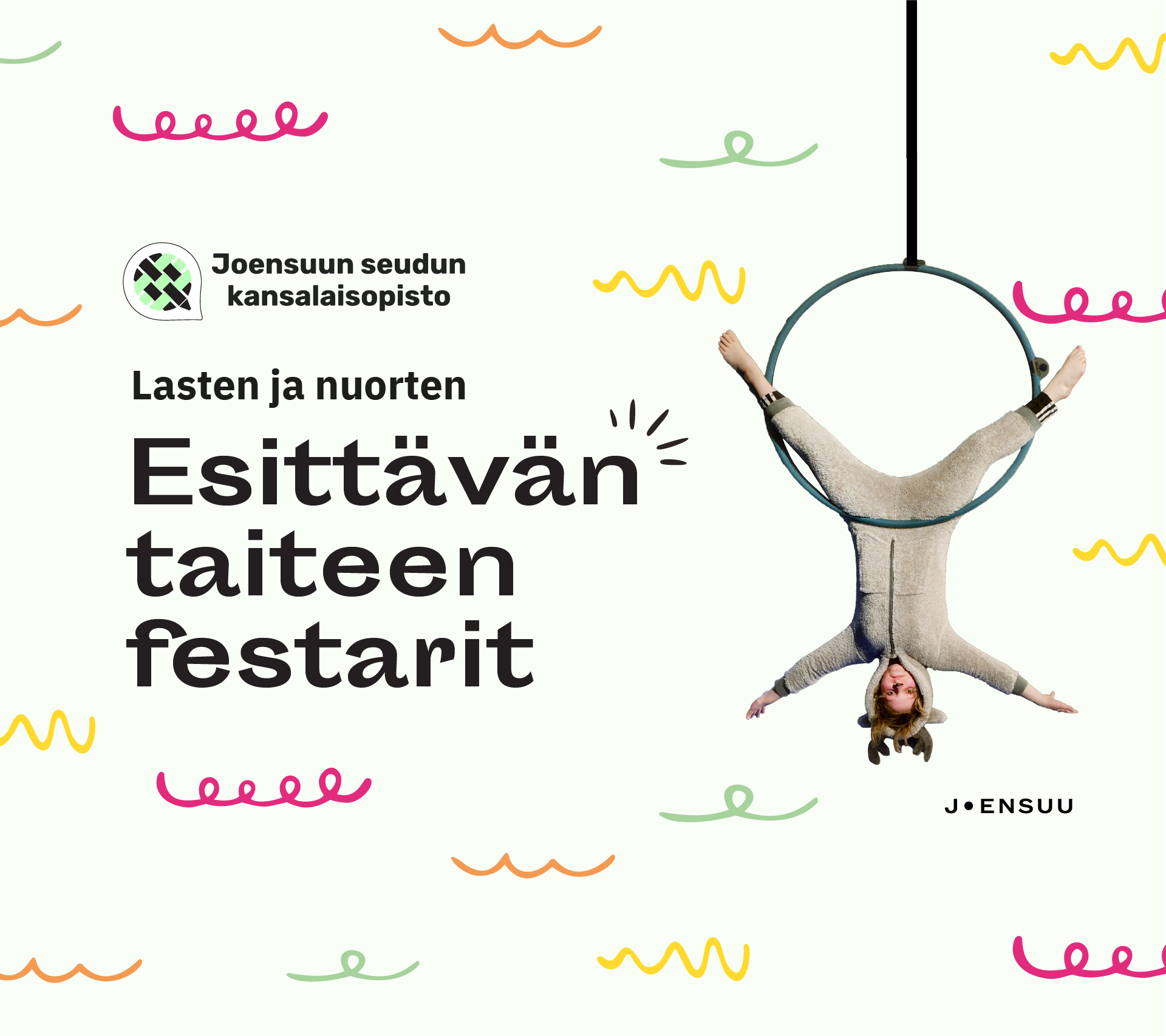 Lasten ja nuorten esittävän taiteen festarit. Hirvipukuinen lapsi roikkuu pää alaspäin renkaassa.